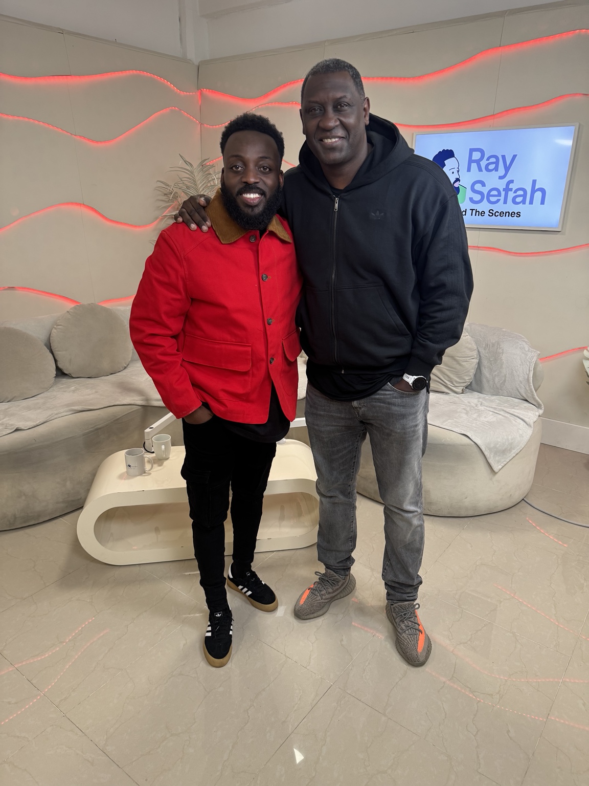 Ray Sefah with Emile Heskey in the Behind the Scenes studio